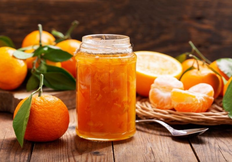 Glass jar of orange tangerine Foods to stock up on SS