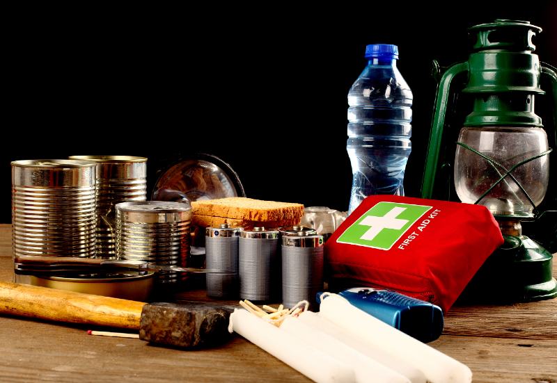 Items for emergency on wooden table-BUDGET SURVIVAL KIT
