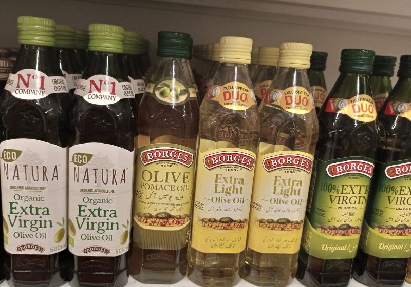 Olive Cooking oil on the shelf of a supermarket Foods to stock up on SS
