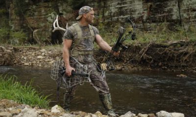 Bow hunter tracking prey | Summer in the Woods: How to Keep Cool While Hunting | featured