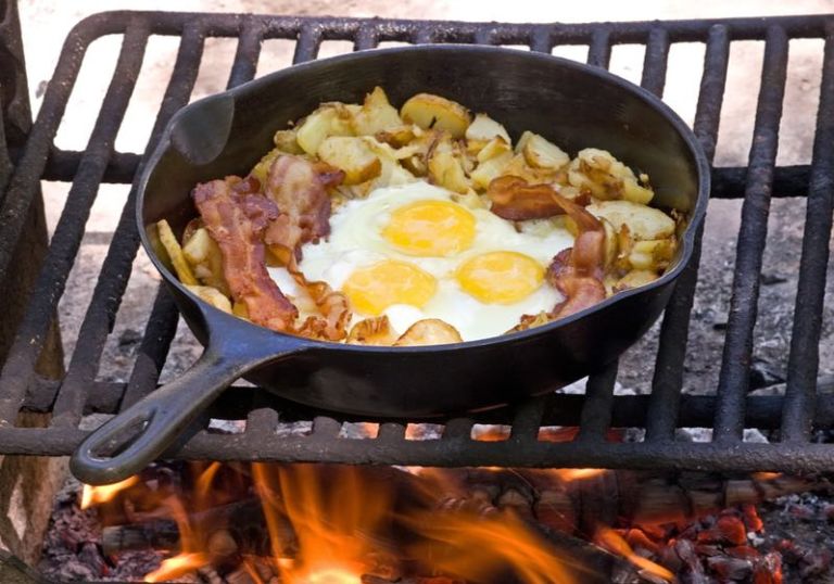Campfire breakfast of eggsbacon and potatoes Car camping essentials SS