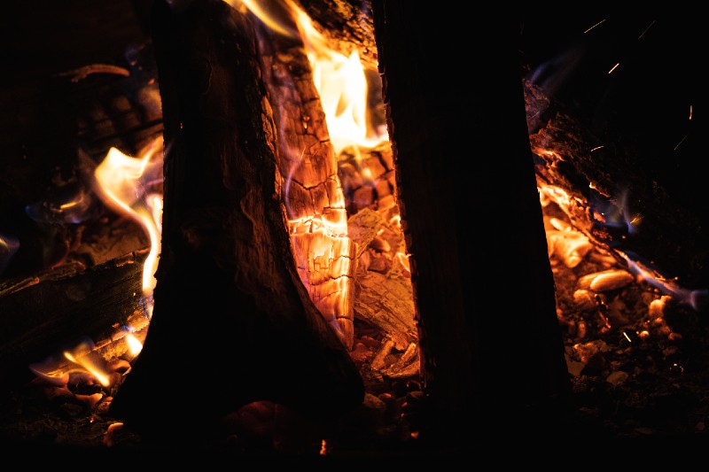 Cozy fireplace in a cabin-Types of Campfires