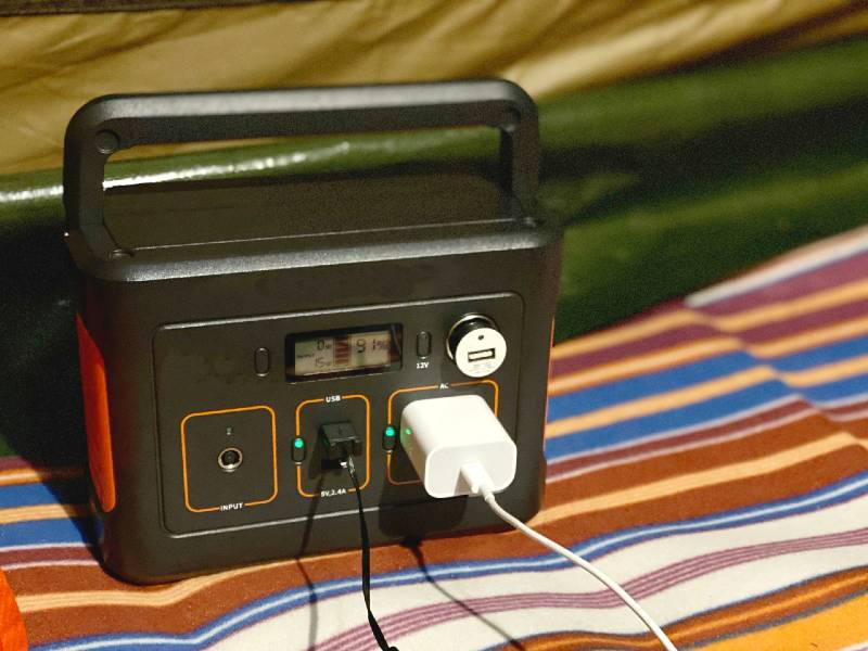 Charging-cord-plugged-into-a-portable-power-supply-Medical-Supplies