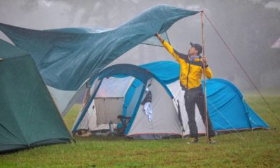 Travelers are repairing tents During the rainy Camping In The Rain ss featured