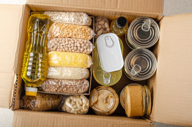flat-lay-view-uncooked-foods-carton-prepper-gifts