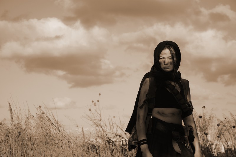 A female militiaman in a post-apocalyptic desert desert - survival skills