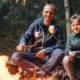 Father son roast marshmallows | REI Camping | Featured