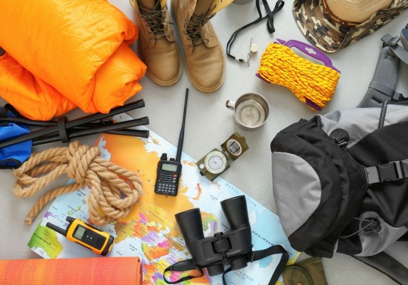 Flat lay composition with sleeping bag | setting up a tent