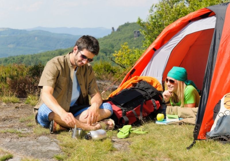 Happy camping couple tent backpack sunny |  How to find the best places to pitch your tent