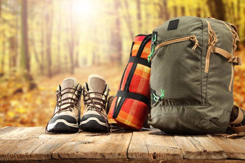 backpack shoes and forest of sun light-Bug Out Bag