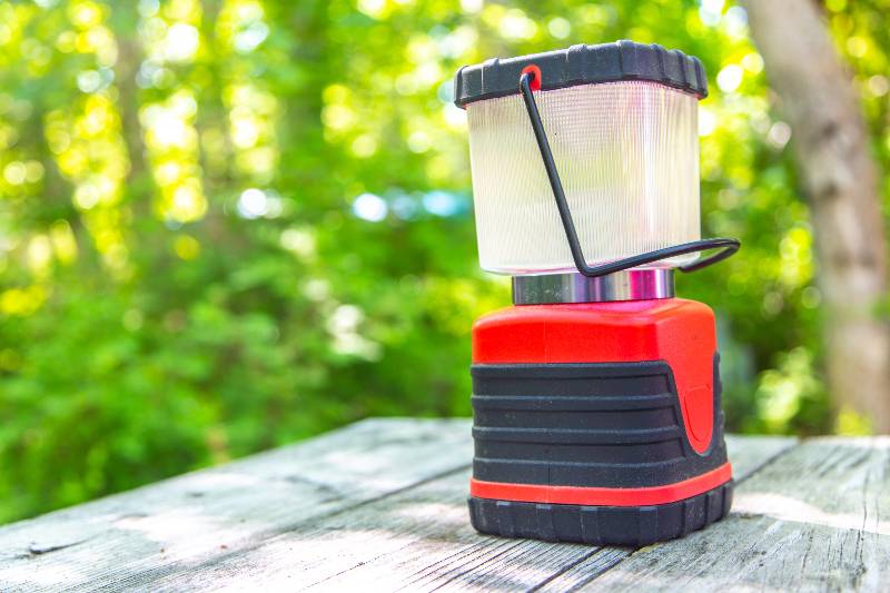 Battery-Operated LED Lantern on Picnic Table in Campground-camping lantern