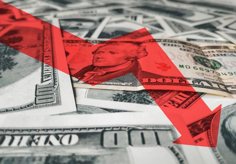 Bright red arrow icon on background money | What to own when the dollar collapses