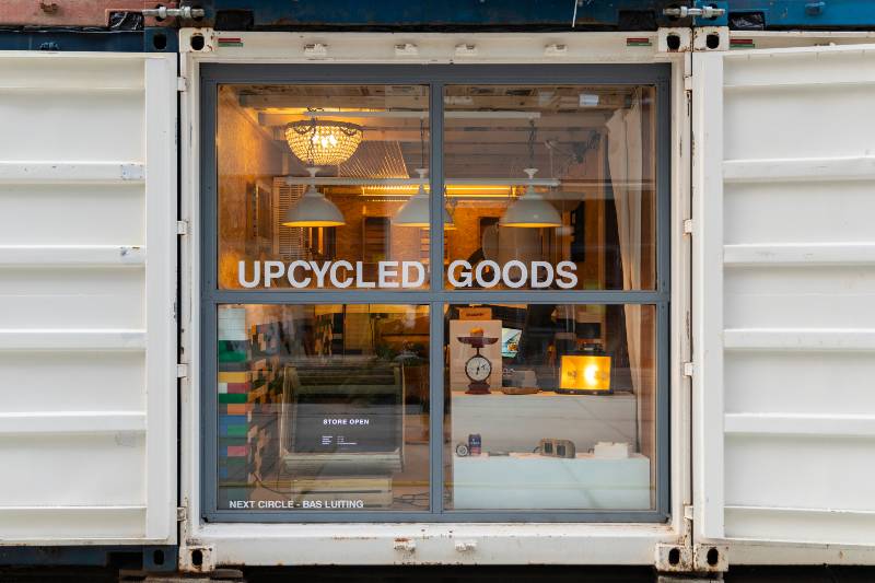 A view of a store in a shipping container where you can buy upcycled goods-Upcycling