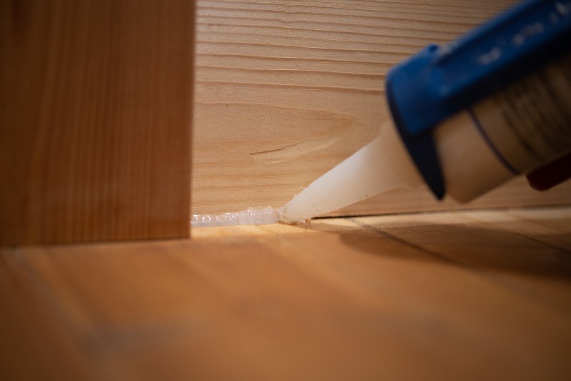 Applying Silicone Caulking Between Wood | bed frame joinery