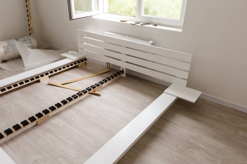Assembling wooden bed in room | bed frame joinery