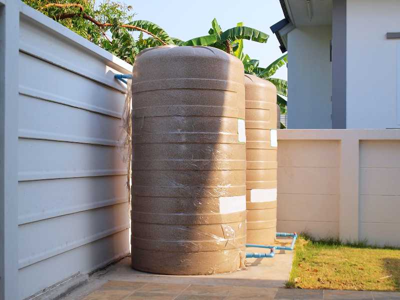 Outdoor cream plastic water tank Two water tanks mounted-How to Prepare for Climate Change