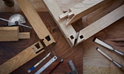 Overhead shot of intricate Japanese joinery and hand tools | Japanese Joinery | featured