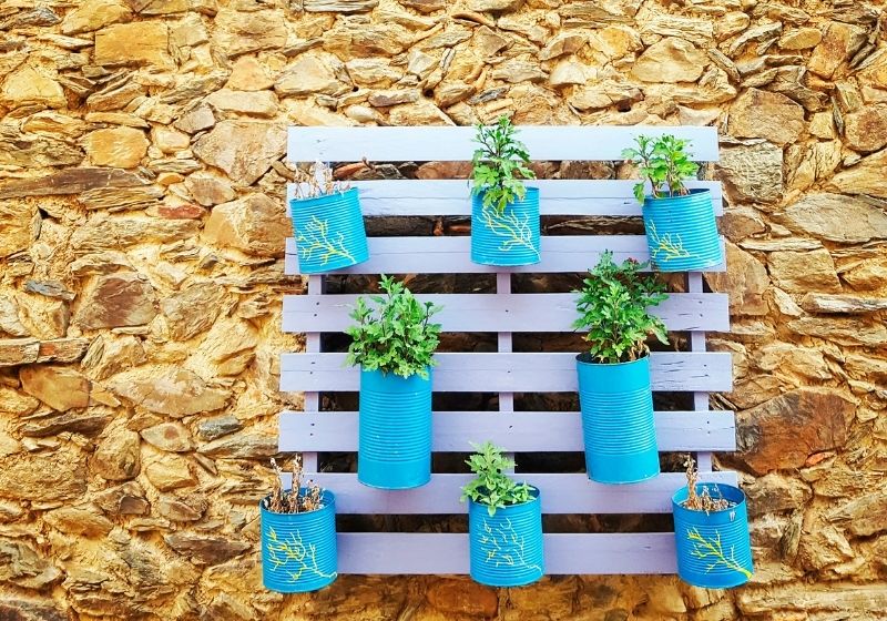 Planter for plants made with recycled pallet | upcycling garden ideas water bottles