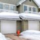 Panorama Facade of home with snowy driveways in front of two car garage viewed in winter | How to Melt Snow on Driveway: 6 Amazing DIY Tricks | featured