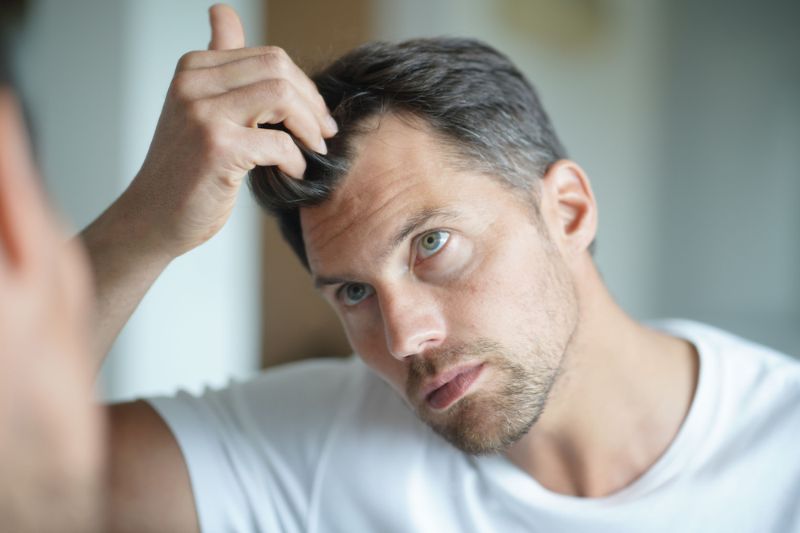 portrait-man-worried-about-hair-loss Hair Loss