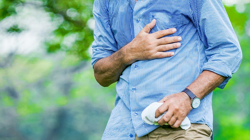 Senior man suffering from chest pain outdoor in park | What to Do When Having a Heart Attack Alone | How to Survive a Heart Attack When Alone