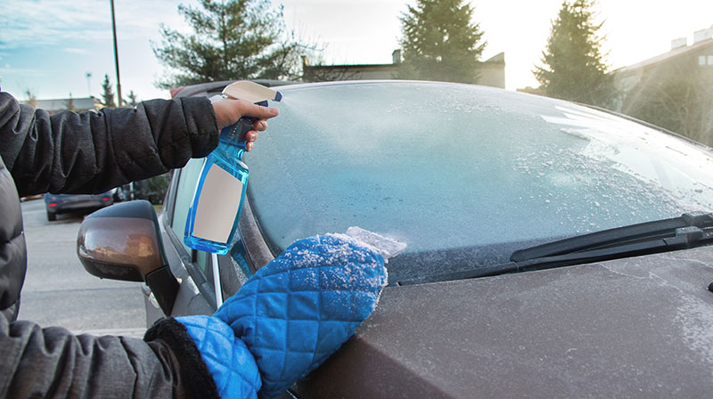 Man uses defroster spray to remove frost from the car windshield | Homemade Ice Melt | The Easy Way to Melt Ice You Never Knew About (It’s Not Salt!)