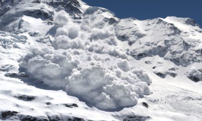 Avalanche rumbling down steep mountain slope | Avalanche airbag | Featured