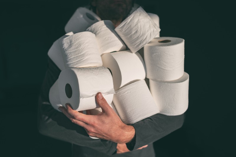 Toilet paper shortage coronavirus panic buying man hoarding carrying many rolls | Toilet Paper Shortage 2021