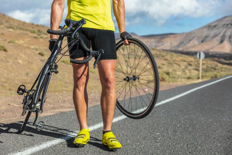 bike-repair-cyclist-man-on-side How To Fix a Flat Bike Tire