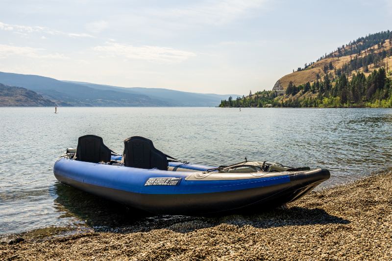 Blue Inflatable Kayak by the Lake on a Warm Summer Sunny Day | Valentines Day Camping