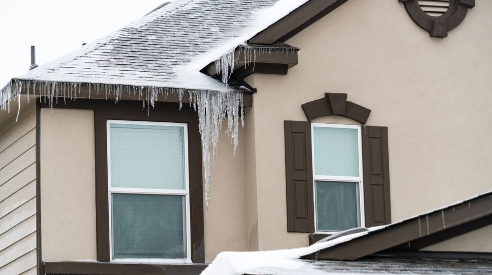 home-covered-dangerous-huge-ice-cycles how to prepare for power outage in winter | Featured Image