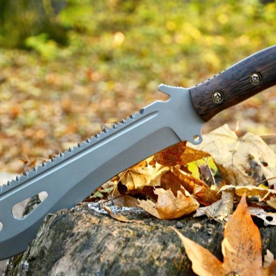 machete-stuck-stump best survival machetes | FEATURED IMAGE