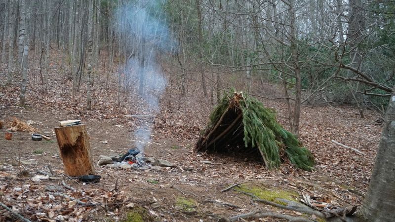 primitive-bushcraft-survival-debris-hut-campfire preppers guide