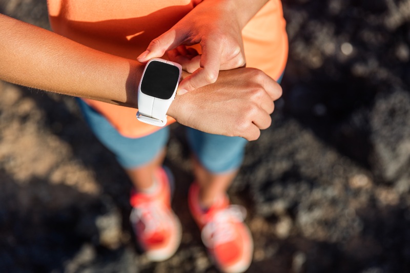 Trail Runner Athlete Using Her Smart Watch App | Valentines Day Camping