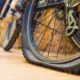 two-bicycles-yard-one-flat-tyre How To Fix a Flat Bike Tire | Featured Image
