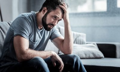 Unpleasant pain. Sad unhappy handsome man | How to Survive Depression | Featured