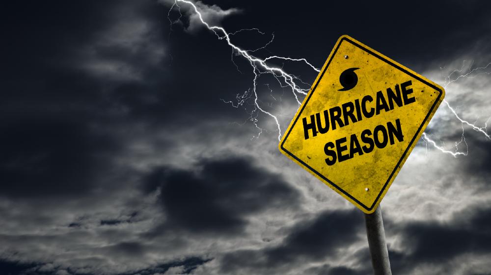Hurricane season with symbol sign against a stormy background and copy space Hurricane Survival Tips ss featured 1