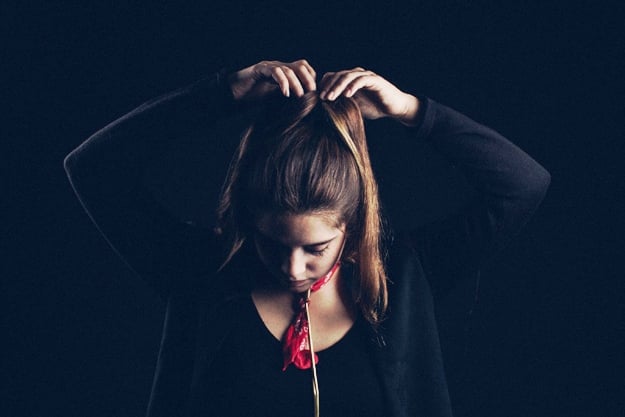 woman fixing her hair self defense tips us 1